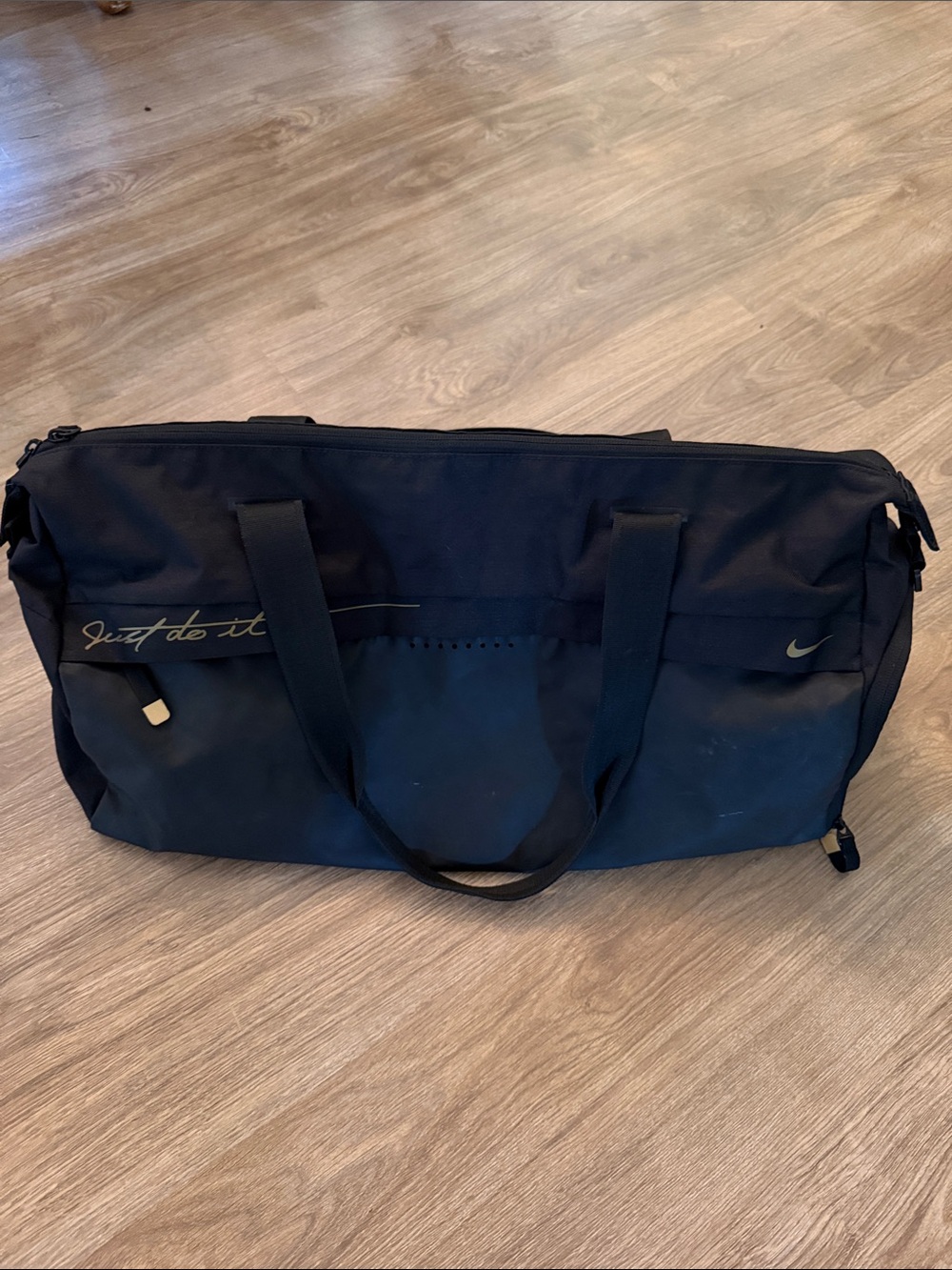 Nike Black Duffel Bag with Gold Accents